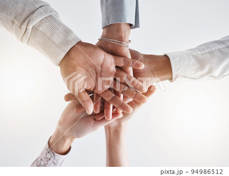 Teamwork hands, partnership and collaboration support for winner, motivation and vision of goals. Below business group people connect in trust, success commitment and working for solidarity together 94986512