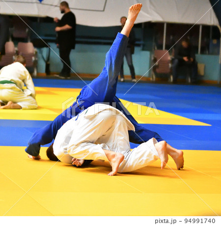 Two boys fighter compete in Judo 94991740