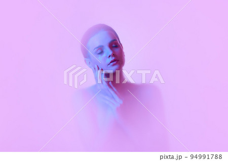 Tenderness. Silhouette of young girl immersed in clouds of smoke, fog on pink neon background with backlight diffuser. Art, creativity, futurism Tenderness. Silhouette of young girl immersed in clouds of smoke, fog on pink neon background with backlight diffuser. Art, creativity, futurism 94991788