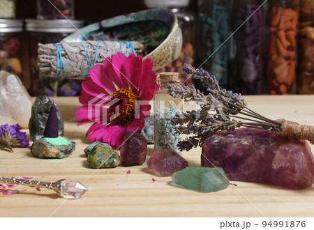 Dried Flowers and Crystal Stones on Meditation Altar Shallow DOF 94991876