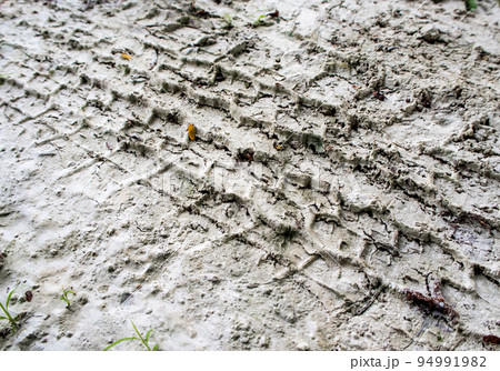 Tire tracks texture of truck on the mud 94991982