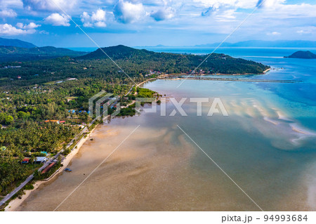 Aerial view of Hin Kong beach and its sand bank, in Koh Pha Ngan, Thailand Aerial view of Hin Kong beach and its sand bank, in Koh Pha Ngan, Thailand 94993684