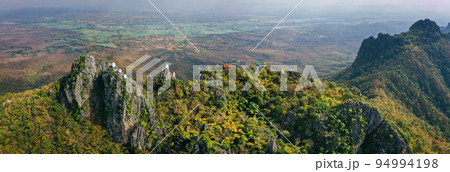 Aerial view of Wat Chaloem Phra Kiat Phrachomklao Rachanusorn, sky pagodas on top of mountain in Aerial view of Wat Chaloem Phra Kiat Phrachomklao Rachanusorn, sky pagodas on top of mountain in 94994198