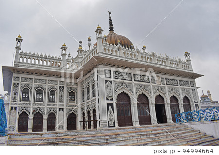 Wooden window with verses in Arabic calligraphy of Chota Imambara initially a congregation hall for Shia Muslims. Built by Muhammad Ali Shah, Lucknow, Uttar Pradesh, India 94994664