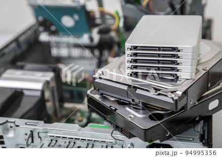 Closed-up view of SSD and SATA hard disk drives Closed-up view of SSD and SATA hard disk drives 94995356