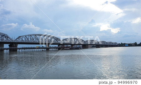 View of Vivekananda Setu or Bally Bridge over the Hoogly riverfrom Dakshineswar Kali Temple, Kolkata, West Bengal, India. View of Vivekananda Setu or Bally Bridge over the Hoogly riverfrom Dakshineswar Kali Temple, Kolkata, West Bengal, India. 94996970