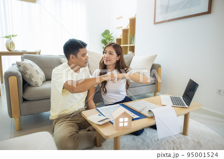 Asian couple in home or house. Asian couple in home or house. 95001524