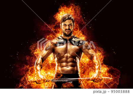 Sportive man in leather warrior costume with sword, fire on background 95003888