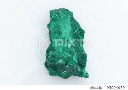 Natural gemstone green malachite on white background 95004079
