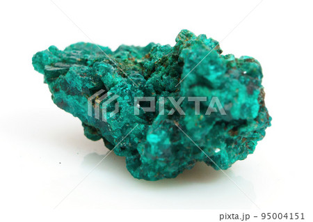 Natural natural stone green dioptase on a white background Natural natural stone green dioptase on a white background 95004151