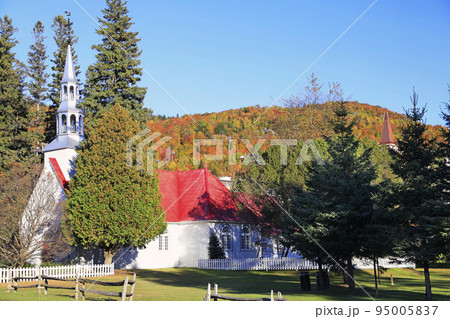 Church surrounded by colorful autumn leaves at Mont Tremblant Church surrounded by colorful autumn leaves at Mont Tremblant 95005837