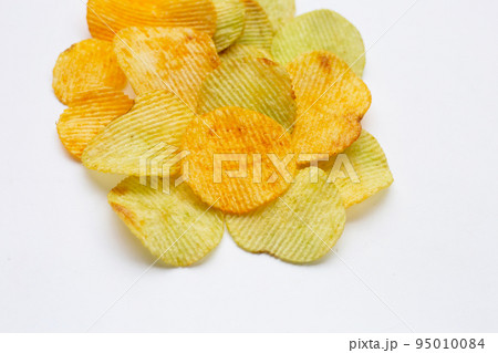 Potato chips on white background. 95010084