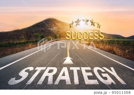 Strategy written on asphalt road in sunset concept of goals and challenges or career path success business opportunity and change. Strategy written on asphalt road in sunset concept of goals and challenges or career path success business opportunity and change. 95011308