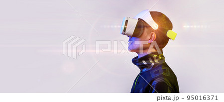 Man is using virtual reality headset. Concept of virtual, augmented and extended reality and metaverse. 95016371