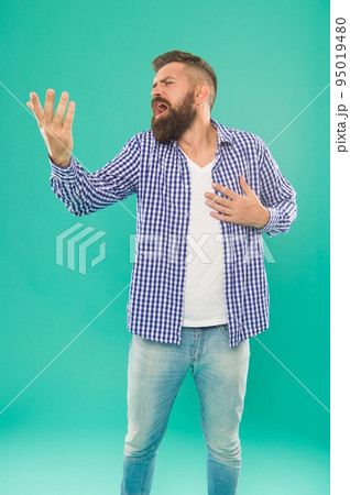 listen to my song. caucasian guy with beard and mustache singing serenade. 95019480
