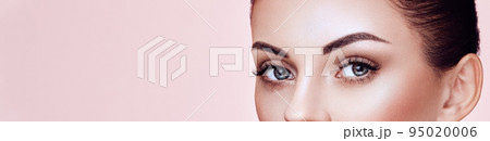 Beautiful woman with long false eyelashes Beautiful woman with long false eyelashes 95020006