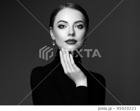 Beautiful woman face with perfect makeup Beautiful woman face with perfect makeup 95020221