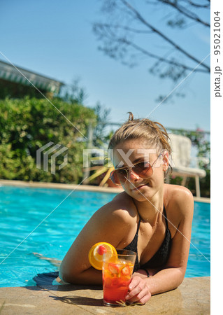 a pretty young girl at the pool a pretty young girl at the pool 95021004