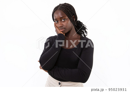 Portrait of bored young woman looking at camera 95023931