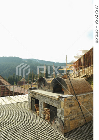 Grill place for cooking outdoor in mountain resort Grill place for cooking outdoor in mountain resort 95027587