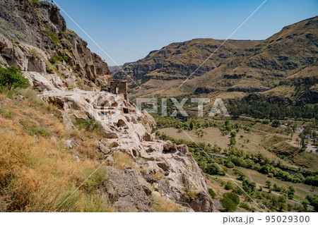Vardzia, a cave monastery in Georgia. cave monastery and ancient city. Caves in the rock close-up. Landmark of Georgia 95029300