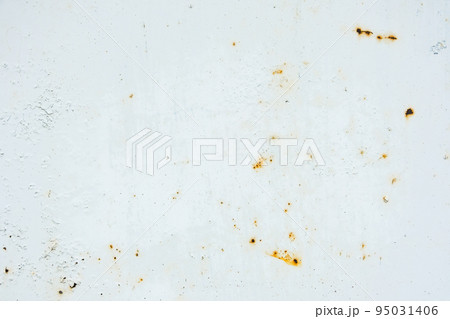 Corrosion of metal. Rust shows through the white 95031406