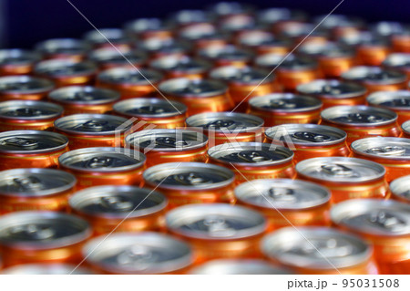 A lot of beer aluminum cans background texture. Sale of alcohol in a hypermarket A lot of beer aluminum cans background texture. Sale of alcohol in a hypermarket 95031508