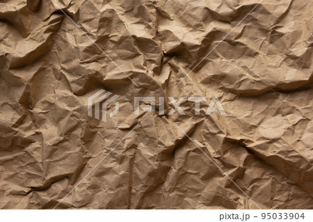 Crumpled parcel paper background texture copy space Crumpled parcel paper background texture copy space 95033904