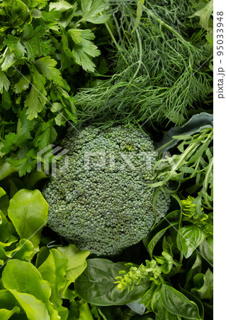 Variety of fresh vegetables on background at table. Salad ingredients at tabletop top view 95033948