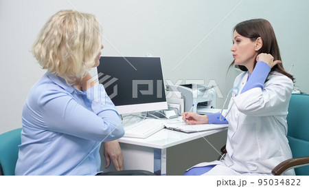 Woman complains of migraine and neck pain before scanning 95034822