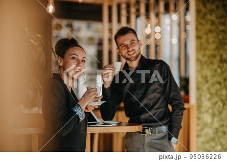 Businessman and businesswoman use modern devices, laptop, tablet and smartphone and arrange new projects for the job. Businessman and businesswoman use modern devices, laptop, tablet and smartphone and arrange new projects for the job. 95036226