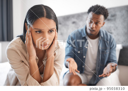 Couple fight, marriage depression and divorce stress, anxiety from mental health and tired of conflict in house bedroom. Sad woman frustrated with headache during communication with man about problem Couple fight, marriage depression and divorce stress, anxiety from mental health and tired of conflict in house bedroom. Sad woman frustrated with headache during communication with man about problem 95038310
