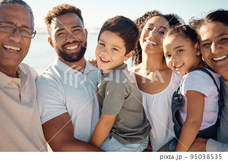 Diversity big family in portrait for summer outdoor holiday with children and grandparents on blue sky and sunshine. Happy smile of grandmother, father and kids for wellness, vitamin d or development 95038535