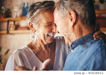 Dancing, happy senior couple smile together and dance with love in retirement. Anniversary celebration at home, mature married healthy man and active woman support each other in retired old age Dancing, happy senior couple smile together and dance with love in retirement. Anniversary celebration at home, mature married healthy man and active woman support each other in retired old age 95038912