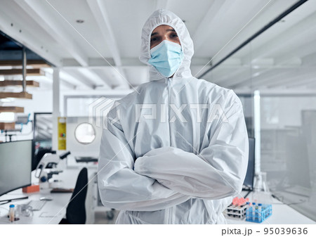 Covid, safety and portrait of man in hazmat suit to protect against covid 19 pandemic, risk or corona virus. Ppe, face mask and medical healthcare worker, doctor or scientist in science laboratory Covid, safety and portrait of man in hazmat suit to protect against covid 19 pandemic, risk or corona virus. Ppe, face mask and medical healthcare worker, doctor or scientist in science laboratory 95039636