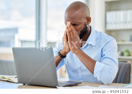 Stress, anxiety and tired businessman with a laptop suffering from burnout while frustrated, fail and mistake in the office. Entrepreneur suffering from headache with a deadline working at a desk Stress, anxiety and tired businessman with a laptop suffering from burnout while frustrated, fail and mistake in the office. Entrepreneur suffering from headache with a deadline working at a desk 95041552