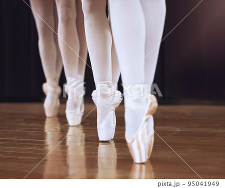 Ballet, fitness dancer and woman on theatre stage for dance workout, exercise and training creative art. Partnership, teamwork and zoom sport girl legs or ballerina women working together on concert. 95041949