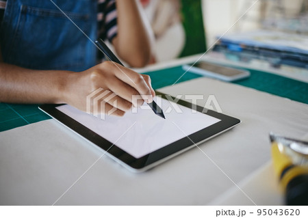 Mockup, screen and tablet of designer drawing for creativity while working in art workshop. Hands of artist, painter or animation worker with creative idea for advertising project at table in office 95043620