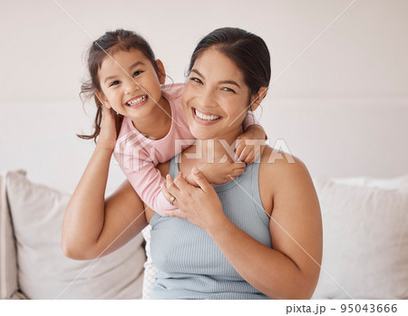 Woman with happy girl, smile in bedroom with pajamas in morning on weekend or vacation. Asian mother with child on bed, express love and happiness, in room at holiday house or their family home 95043666