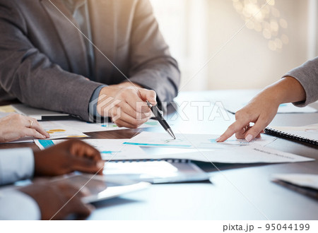 Corporate table, documents and hands in conversation on business analytics data report in office. Company workforce logistics, planning and strategy idea with professional communication. 95044199
