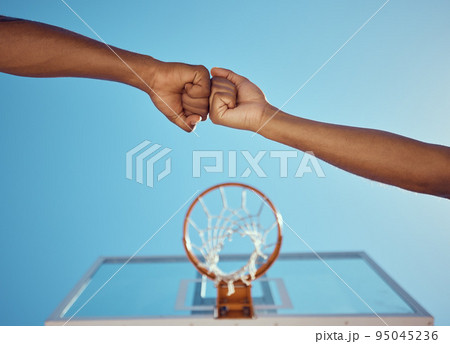 Hands of basketball friends or team fist bump at game training and practice match at basketball court. Competitive athlete people in unity, solidarity and union play together sports hobby for fitness Hands of basketball friends or team fist bump at game training and practice match at basketball court. Competitive athlete people in unity, solidarity and union play together sports hobby for fitness 95045236