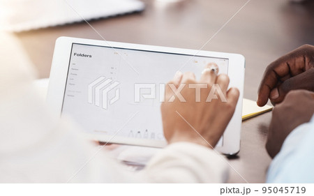 Hands, tablet and data of an analyst or employee in digital file management app at the office. Hand of business people working with touchscreen technology to manage and organize company information Hands, tablet and data of an analyst or employee in digital file management app at the office. Hand of business people working with touchscreen technology to manage and organize company information 95045719