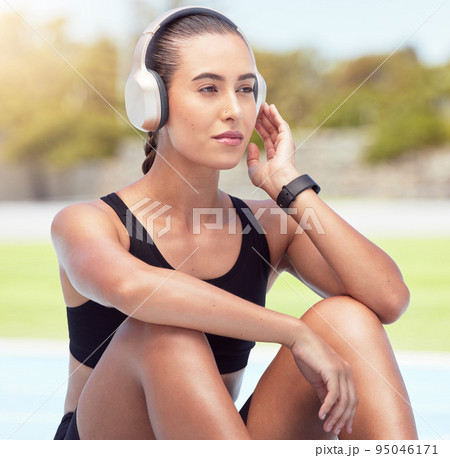 Relax, fitness and runner with headphone music for outdoor sports leisure and rest break. Wellness, motivation and workout woman enjoying rest time with audio technology streaming device. Relax, fitness and runner with headphone music for outdoor sports leisure and rest break. Wellness, motivation and workout woman enjoying rest time with audio technology streaming device. 95046171