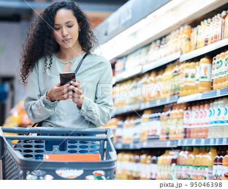 Supermarket, phone and woman shopping, search and on internet for grocery store product, drink or juice. Customer on 5g technology fintech app for buying healthy or wellness food in inflation economy 95046398