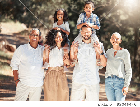 Family, walk and smile together in nature, trees and sunshine while on vacation. Mom, dad and grandparents walking with kids in forest, field or park in spring for while on holiday in Philippines 95046446