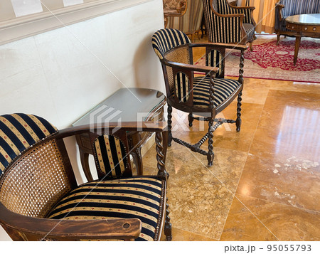 Fragments of vintage luxurious furniture in the Romanov style. 95055793