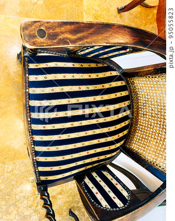 Fragments of vintage luxurious furniture in the Romanov style. 95055823