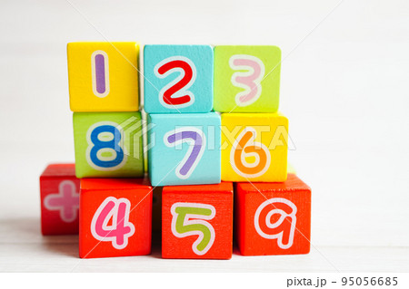 Number wood block cubes for learning Mathematic, education math concept. 95056685