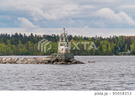 Russia. Leningrad region. May 29, 2022. Lighthouse at the exit to Lake Ladoga from Vladimir Bay. 95058353