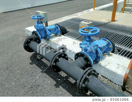 JOHOR, MALAYSIA -AUGUST 1, 2022: Pipe valve is used to control the quantity of water or liquid passing through a pipe. This valve is also used for pipe connections. 95061066